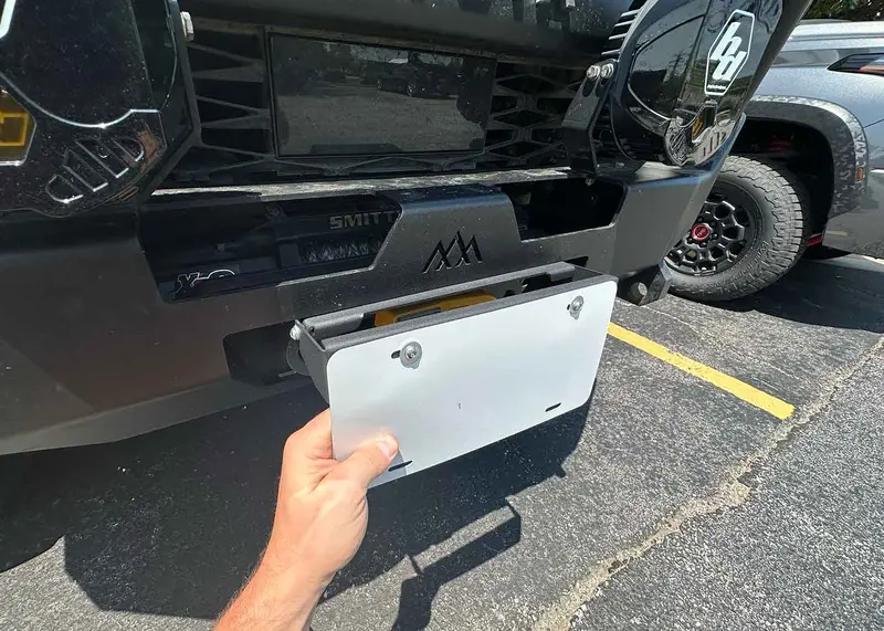 Flip-Up License Plate Mount With Hawse Fairlead Integration 1